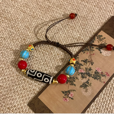 124九眼天珠手编绳男士女士手链藏饰特色